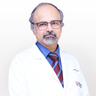 Dr. Manmohan M. Kamat